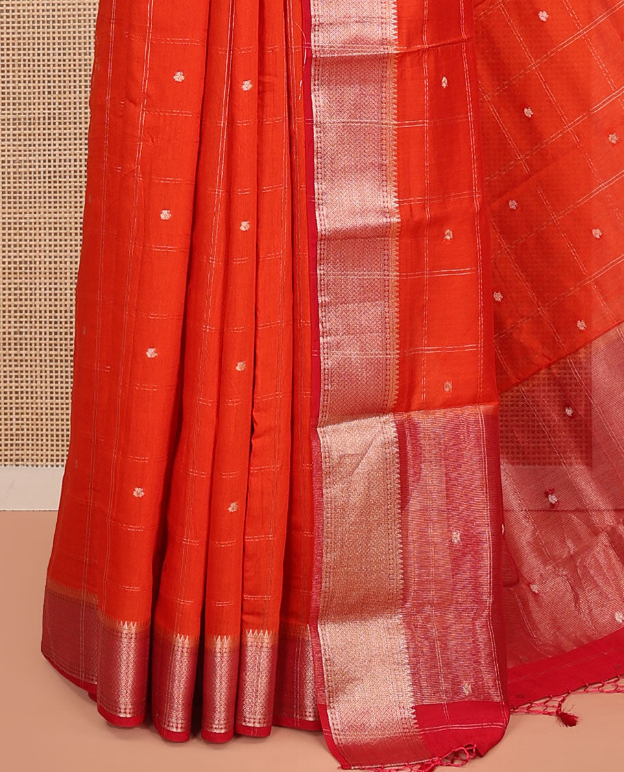 Orange Assam Silk Saree, Highlighted by Zari Butta Enclosed Checked Design, Complemented by Contrast Zari Border of Traditional Designs, Pallu Features Zari Designs, and Paired with a Contrast Blouse