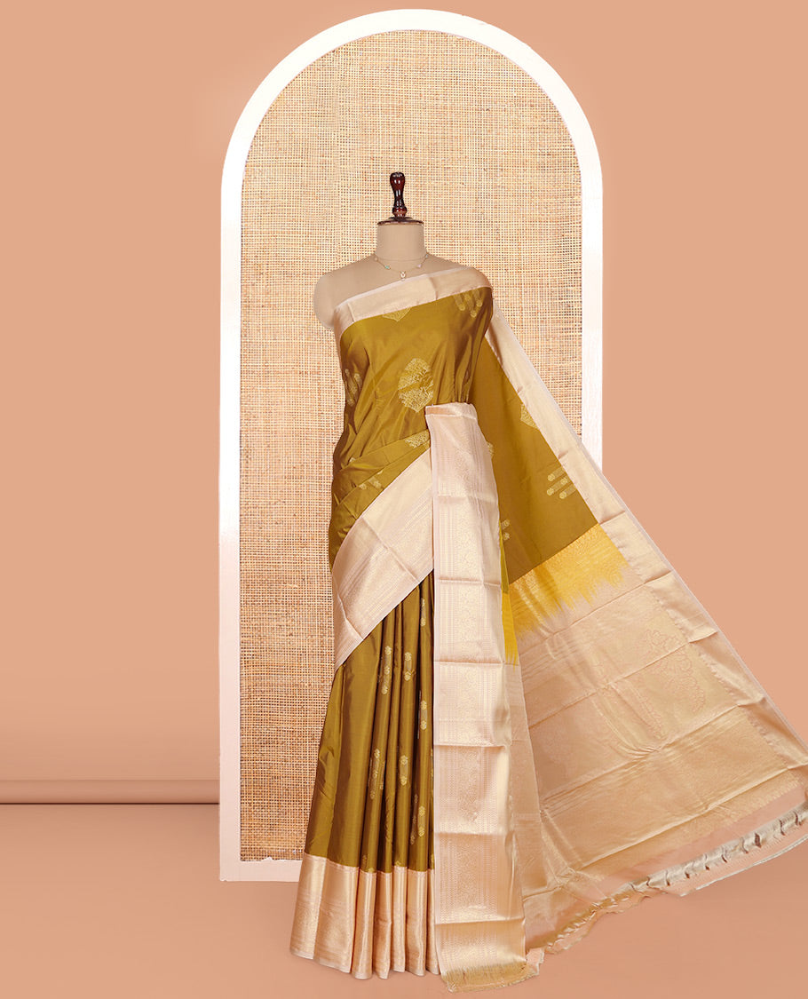 Mustard Budget Silk Saree, Sparsely Woven with Zari Buttas on Its Body, Complemented by a Contrast Traditional Zari Design Border, Intricately Designed Pallu, and Paired with a Contrast Blouse