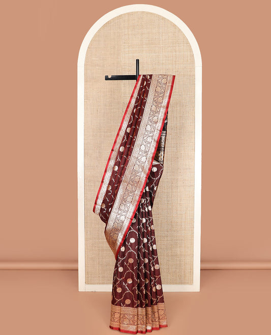 Brown floral jaal jacquard banarasi silk saree, floral creeper design border, and intricate ogee patterned pallu