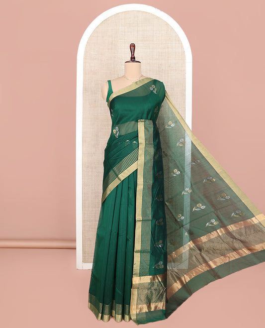Green Chanderi Cotton Saree, Delicately Woven with Floral Buttas All Over Its Body, Highlighted by Zari Border, Pallu of Stripes, and Paired with a Matching Blouse