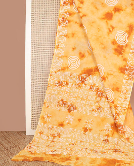 Yellow shibori dyed with spiral motifs block printed cotton saree, self-border, and printed pallu