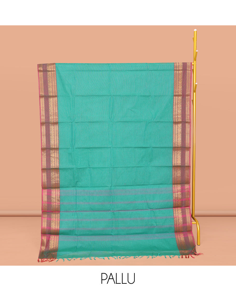 Green Plain Chettinad Cotton Saree, Complemented by a Contrast Traditional Zari Design Border, Subtly Striped Pallu, and Paired with a Matching Blouse