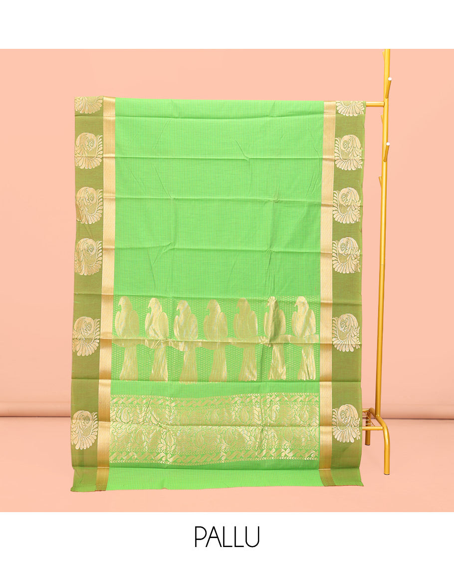Green Semi-Silk Cotton Saree, Subtly Sparkled with Stripes All Over Its Body, Complemented by a Contrast Zari Buttas Woven Border, Pallu of Bird and Paisley Designs, and Paired with a Matching Blouse