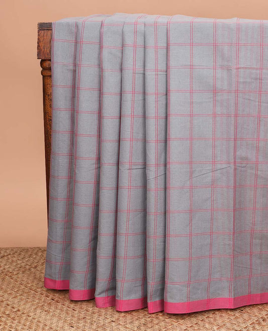 Grey checked Mangalagiri cotton saree with contrast border, striped pallu, and a contrast kalamkari floral printed blouse