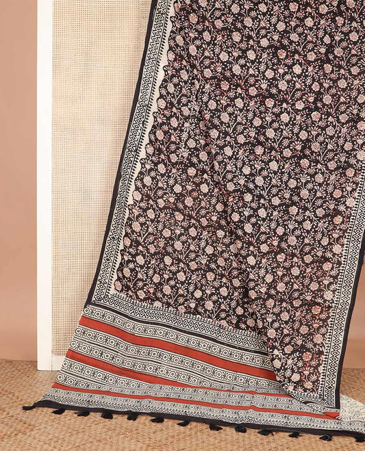Black floral vine machine-printed Kalamkari cotton saree, geometric printed border, and geometric printed pallu