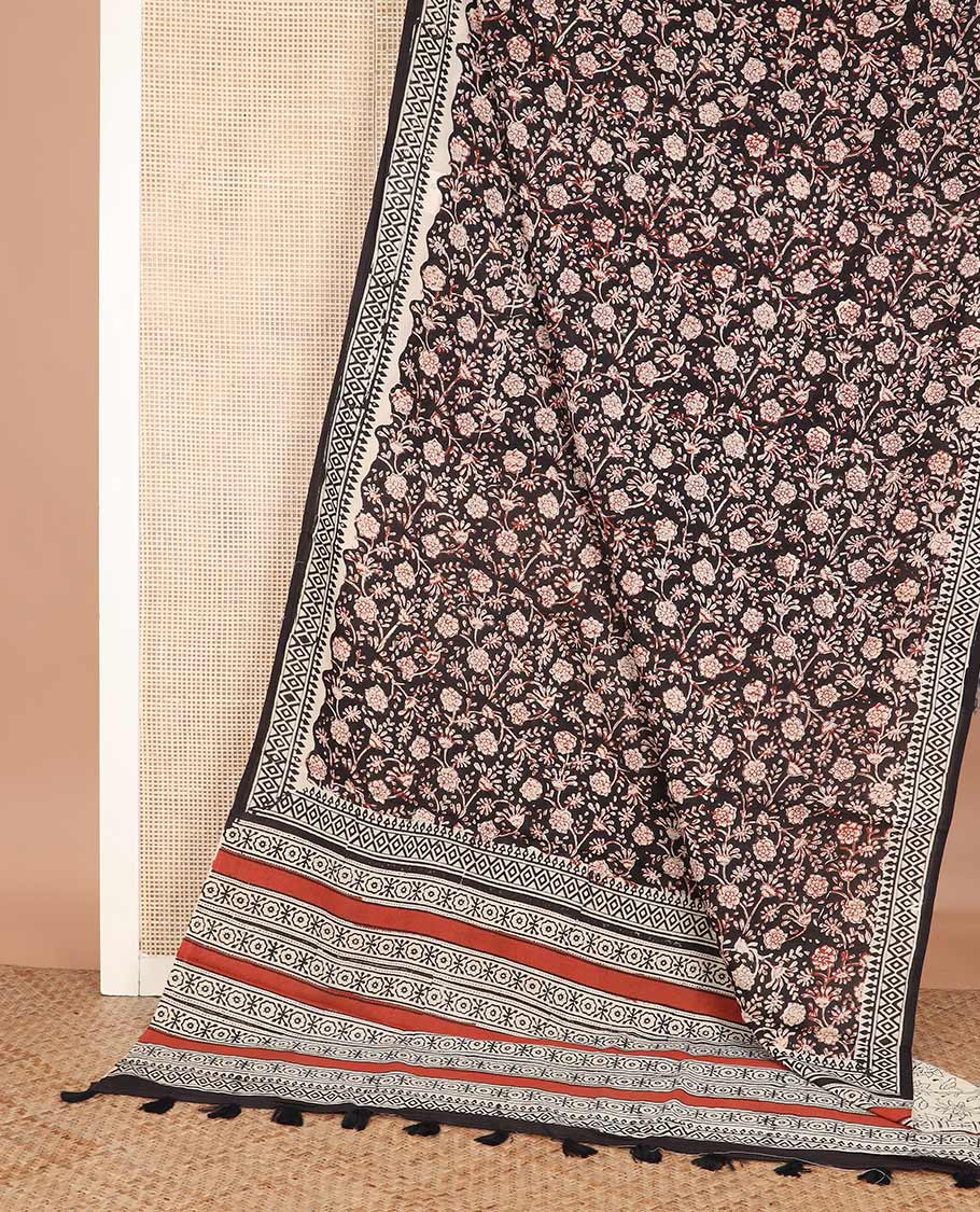 Black floral vine machine-printed Kalamkari cotton saree, geometric printed border, and geometric printed pallu