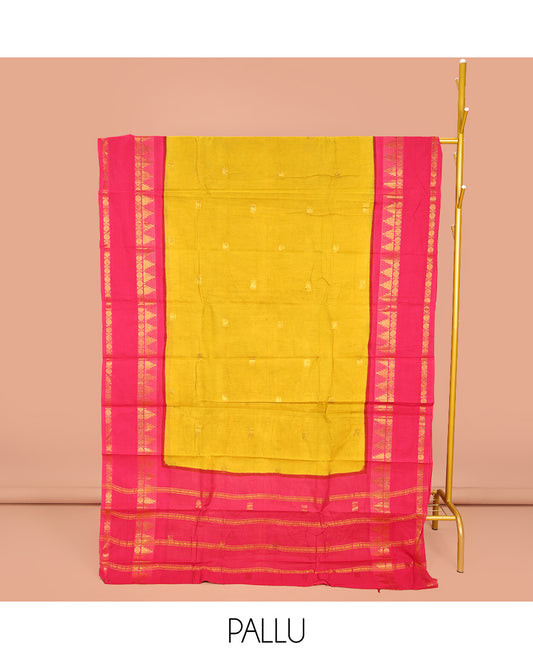 Mustard Sungudi Cotton Saree, Decorated with Zari Buttas on Its Body, Complemented by a Contrast Retttai Pettu Traditional Zari Design Border, Zari-Design Pallu, and Paired with a Contrast Blouse