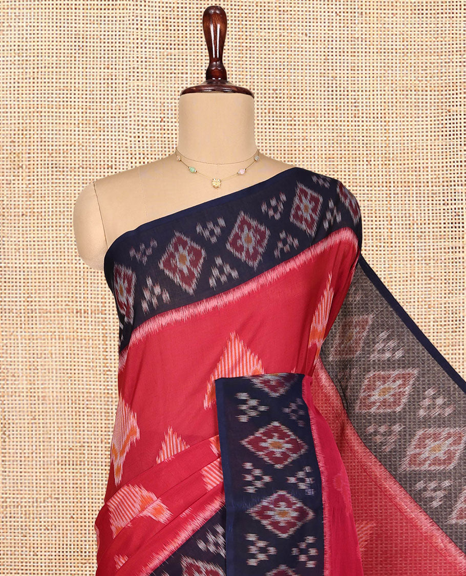 Red Ikkat Cotton Saree, Decorated with Ikkat-style Buttas All Over Its Body, Complemented by a Contrast Ikkat-Textured Border, Pallu of Geometric Patterns, and Paired with a Contrast Blouse