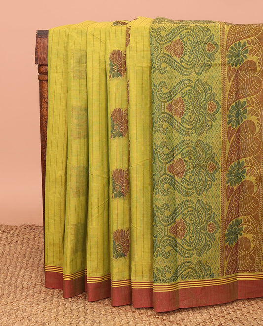 Green Kanchi Cotton Saree, Bedecked with  Stripes and Thread Buttas All Over Its Body, Complemented by a Contrast Border, Pallu Features Intricate Designs, and Paired with a Matching Blouse