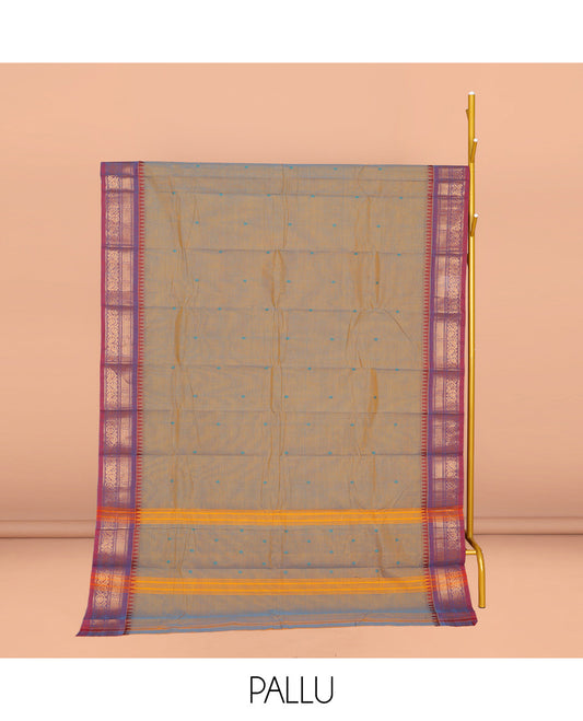 Grey Chettinad Cotton Saree, Sparsely Threaded with Thread Buttas All Over Its Body, Complemented by a Contrast Traditional Zari Design Woven Temple Border, Pallu of Stripes, and Paired with a Matching Blouse