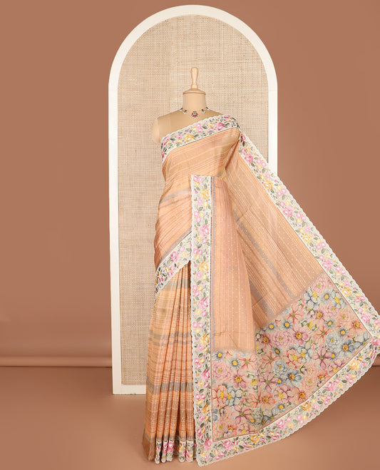 Pastel orange dobby-style buttas dola silk saree, contrast floral embroidered scallop border, and floral printed pallu