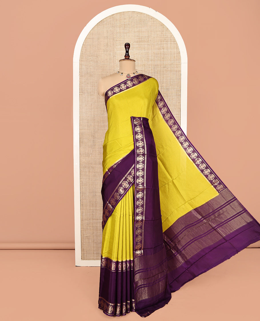 Mustard Plain Dola Silk Saree, Complemented by Contrast Rettai Pettu Ganda Berunda Motifs, Zari Border, Gleaming Zari Striped Pallu, and Paired with a Contrast Blouse
