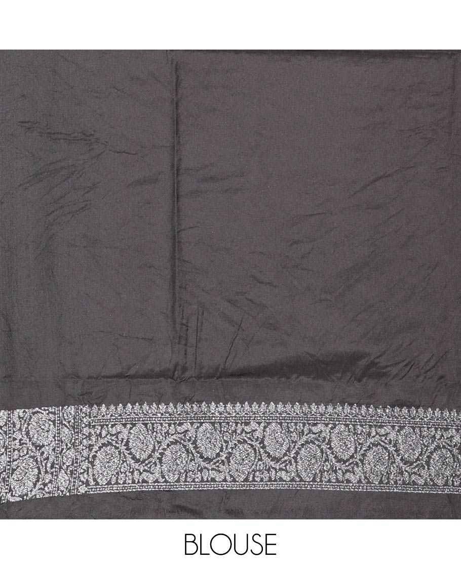 Black Fancy Georgette Saree Decorated with Zari Buttas, Zari Woven Border of Floral Creeper Designs, Zari-Decked Up Pallu of Floral Jaal Designs, and Paired with a Matching Blouse