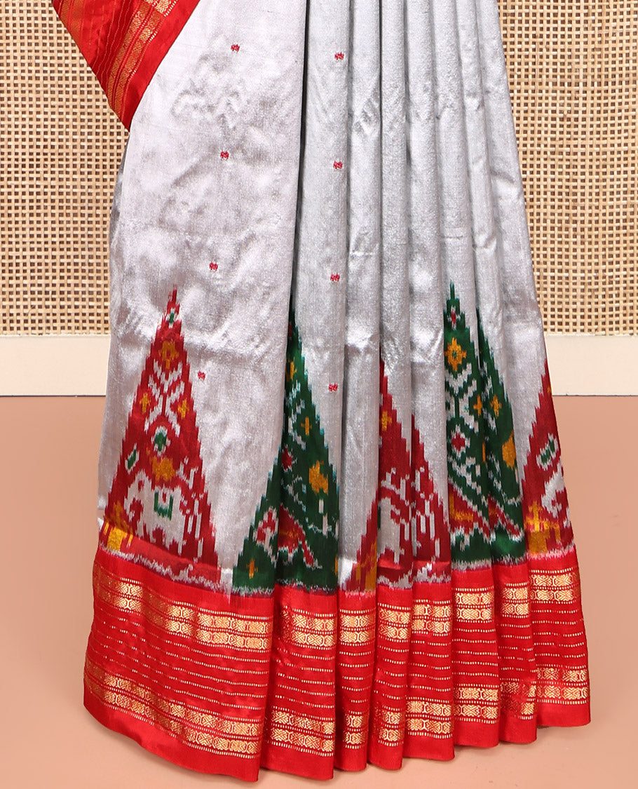 Grey Pochampally Ikat Silk Saree, Subtly Woven with Ikkat Buttas on Its Body, Complemented by a Contrast Temple Border of Traditional Designs, Pallu of Butta Enclosed Checks, and Paired with a Contrast Blouse