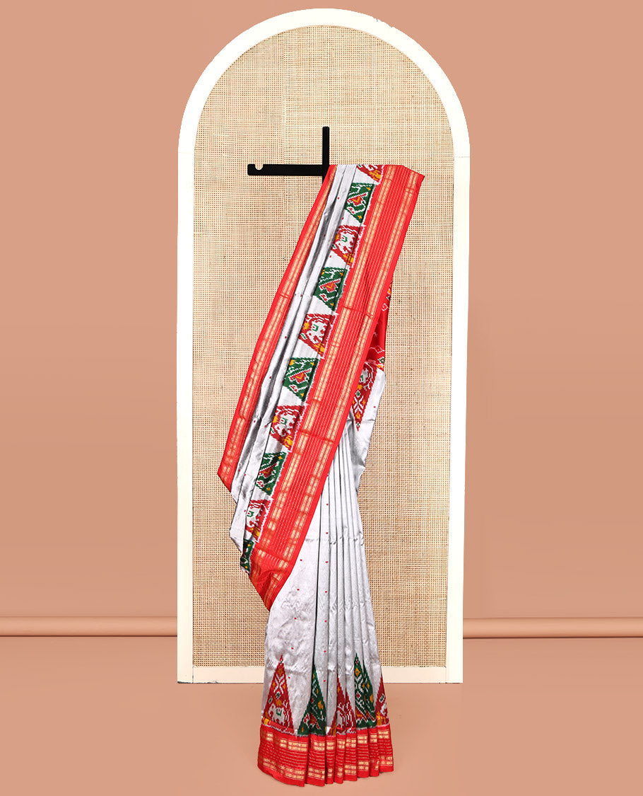 Grey Pochampally Ikat Silk Saree, Subtly Woven with Ikkat Buttas on Its Body, Complemented by a Contrast Temple Border of Traditional Designs, Pallu of Butta Enclosed Checks, and Paired with a Contrast Blouse