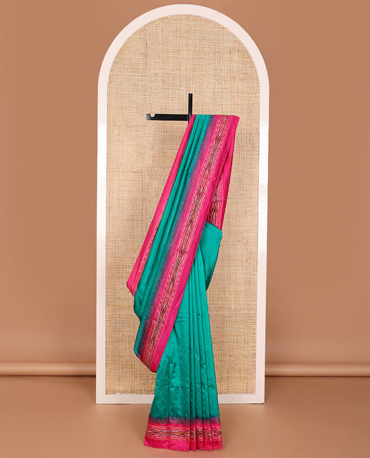 Green plain design ikkat saree, contrast ikkat border & pallu of ikkat designs