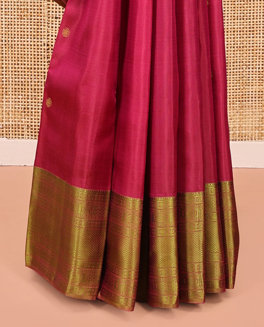 Red Kanchipuram Designer Silk Saree, Subtly Sparkled With Buttas All Over Its Body, Complemented by Contrast Border of Rekku, Rudraksham, Then Kuli Kann, Laddu Kamalam, and Mayil Kann Designs, Jaal Pallu and Paired with a Contrast Blouse