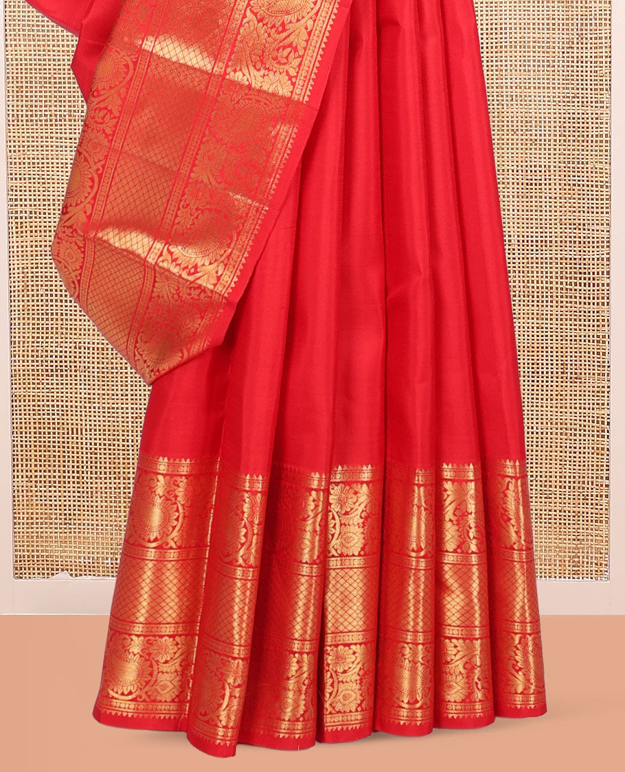Red Kanchipuram Silk Saree, Spotlighted with Zari Buttas, Highlighted by Zari Border of Rekku, Rudraksham, Paisley Vine and Jaal Designs, Jaal Pallu, and a Matching Blouse