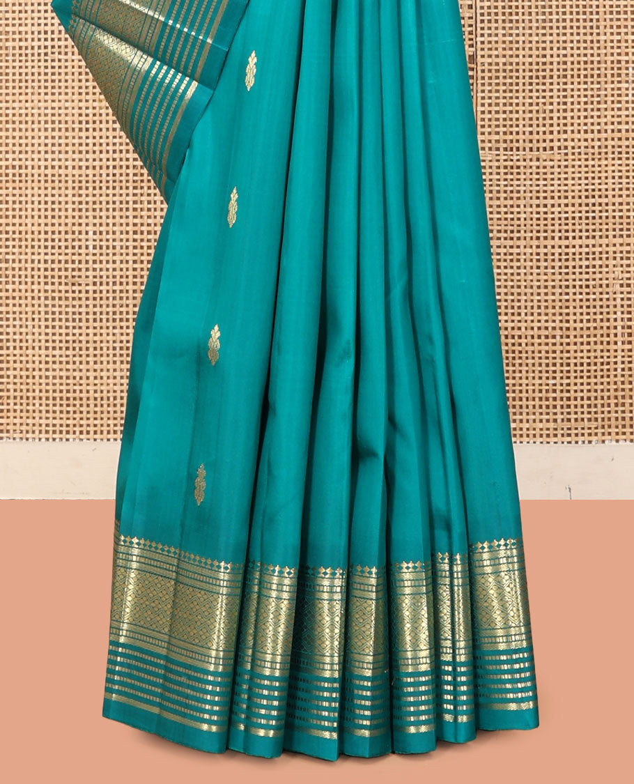 Blue Kanchipuram Silk Saree, Woven with Zari Buttas, a One-Sided Border of Panner Sombu, Banaras, Muthu, and Jaal Designs, a Zari Design Pallu, and No Blouse