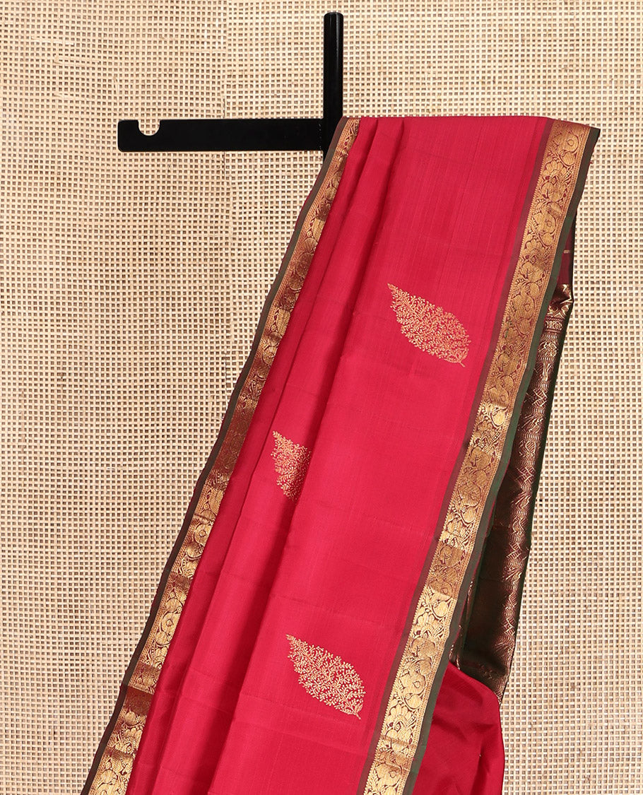 Red Kanchipuram Silk Saree, Woven with Zari Buttas All Over Its Body, Complemented by a Contrast Border of Mayil Designs, Intricately Designed Pallu, and Paired with a Contrast Blouse