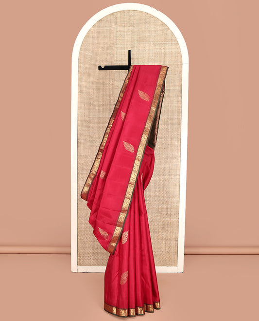 Red Kanchipuram Silk Saree, Woven with Zari Buttas All Over Its Body, Complemented by a Contrast Border of Mayil Designs, Intricately Designed Pallu, and Paired with a Contrast Blouse