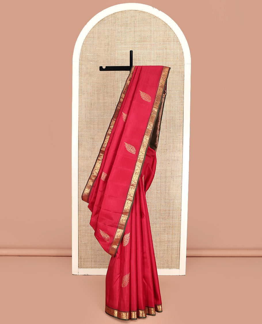 Red Kanchipuram Silk Saree, Woven with Zari Buttas All Over Its Body, Complemented by a Contrast Border of Mayil Designs, Intricately Designed Pallu, and Paired with a Contrast Blouse