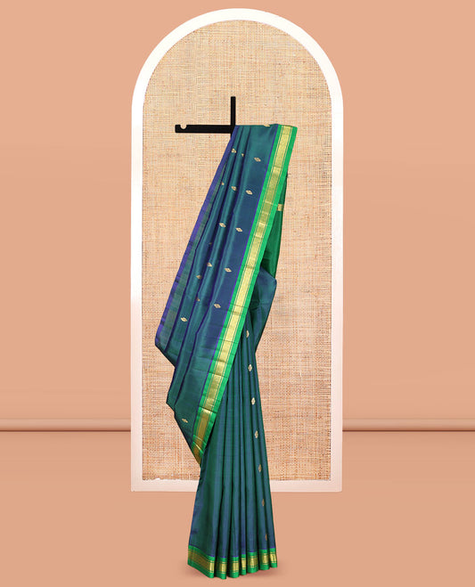 Blue Kanchipuram Silk Saree Featuring Zari Buttas, Complemented by a Contrast One-Sided Border of Banaras, and Jaal Design, Zari Design Pallu, and a No Blouse