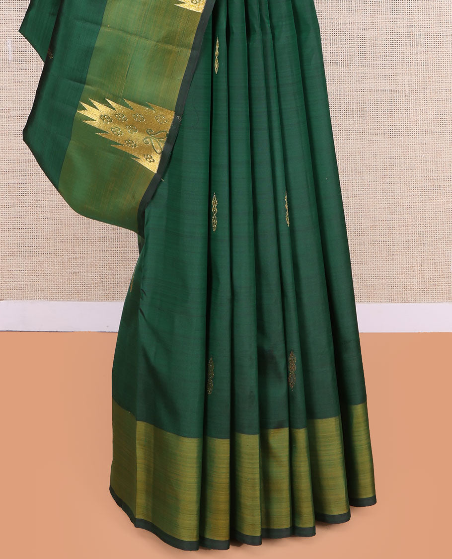Green Kanchipuram Silk Saree, Highlighted by Zari Buttas, a Contrast Thazampoo Rekku Border, Zari Design Pallu, and a Contrast Blouse