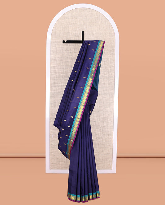 Blue Kanchipuram Silk Saree, Mesmerised with Zari Buttas, a Contrast One-sided Border of Panner Sombu, Banaras, and Mayil Kann Designs, Zari Woven Pallu, and No Blouse