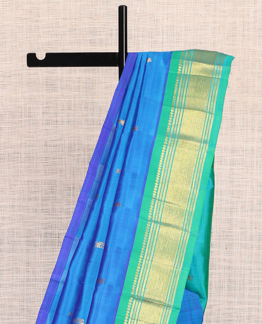 Blue Kanchipuram Silk Saree, Woven with Zari Buttas, a Contrast One-Sided Border of Rekku, Banaras, Muthu, and Mayil Kann Designs, Zari Design Pallu, and No Blouse