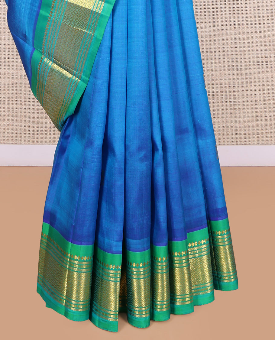 Blue Kanchipuram Silk Saree, Woven with Zari Buttas, a Contrast One-Sided Border of Rekku, Banaras, Muthu, and Mayil Kann Designs, Zari Design Pallu, and No Blouse