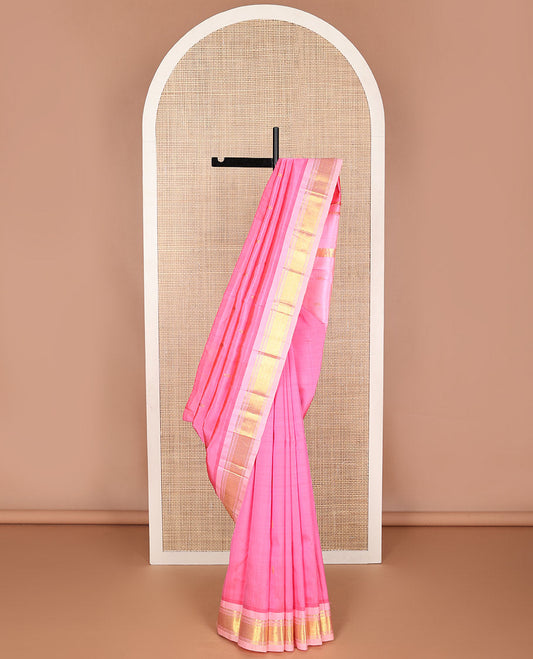 Baby pink buttas kancheepuram silk saree with contrast border of thilakam mokku, banras, checked design & zari design pallu