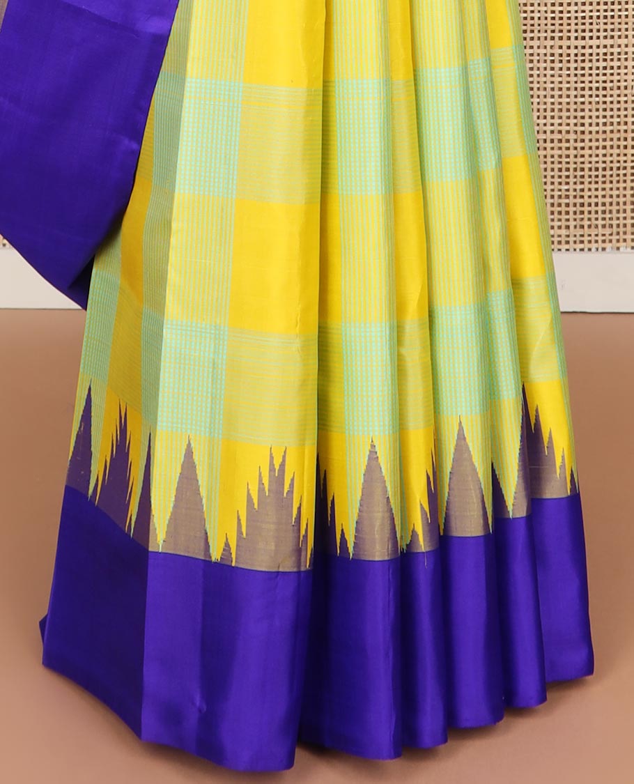 Multi-color checked kancheepuram silk saree with contrast temple border & striped pallu