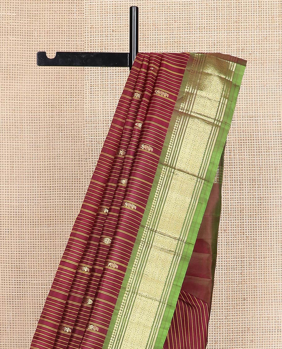 Maroon striped & zari buttas kanchipuram silk saree, contrast one-sided zari border of salngai,banaras,muthu & jaal & zari design pallu