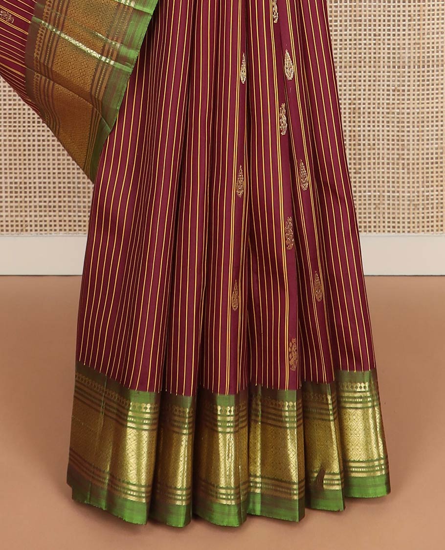 Maroon striped & zari buttas kanchipuram silk saree, contrast one-sided zari border of salngai,banaras,muthu & jaal & zari design pallu