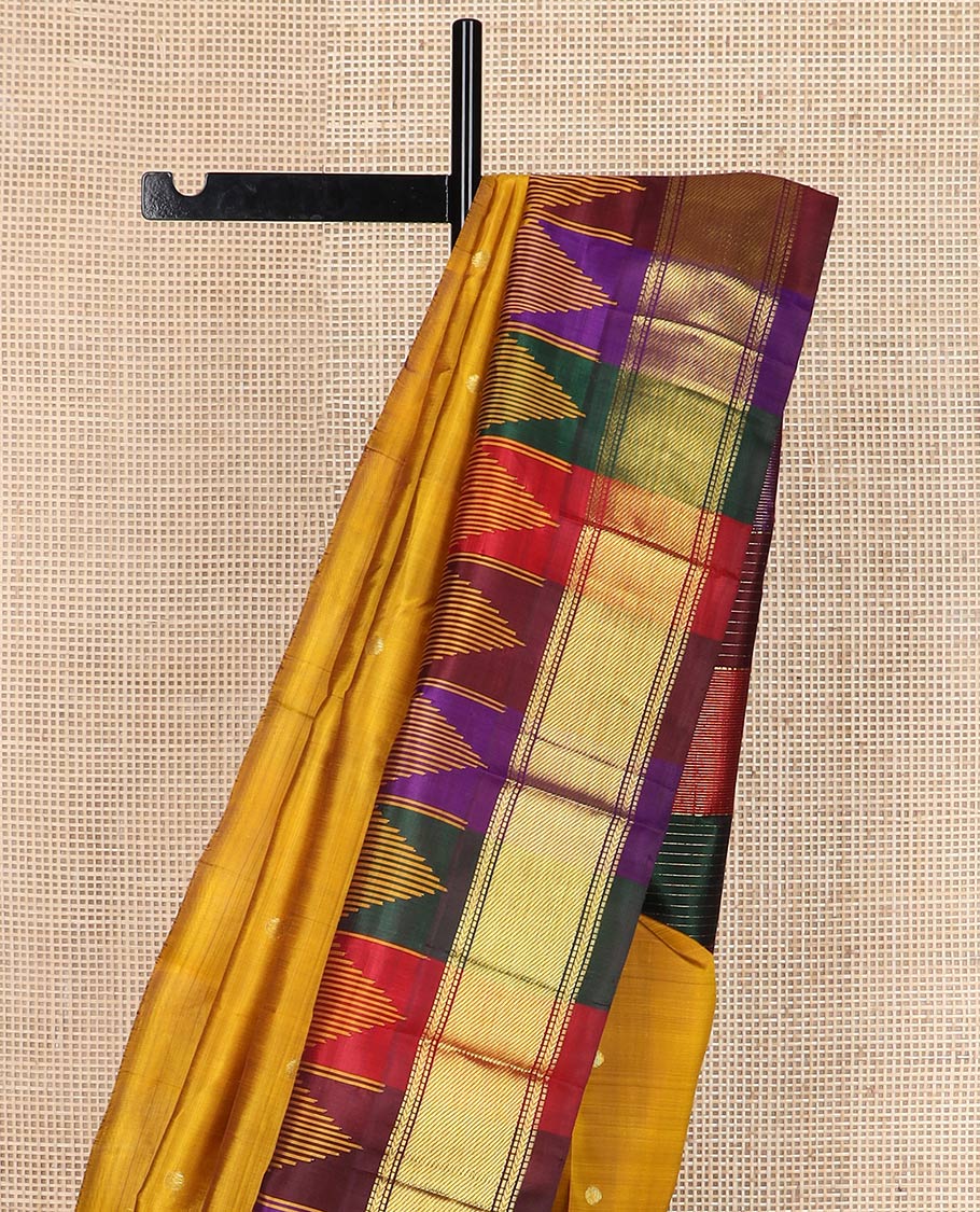 Mustard zari buttas silk saree, contrast one-sided temple border of muthu, kathir & zari stripes & kaleidoscopic-colored striped pallu of zari stripes