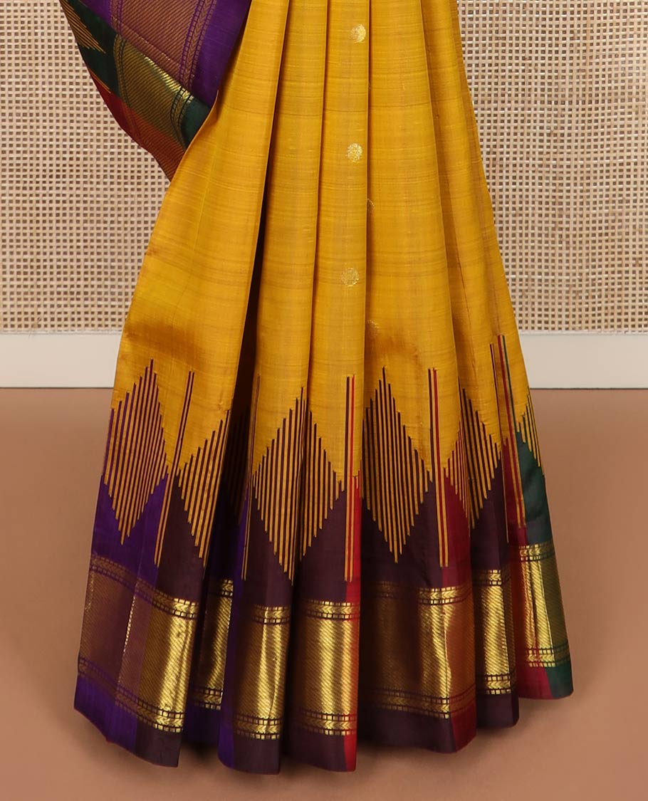 Mustard zari buttas silk saree, contrast one-sided temple border of muthu, kathir & zari stripes & kaleidoscopic-colored striped pallu of zari stripes