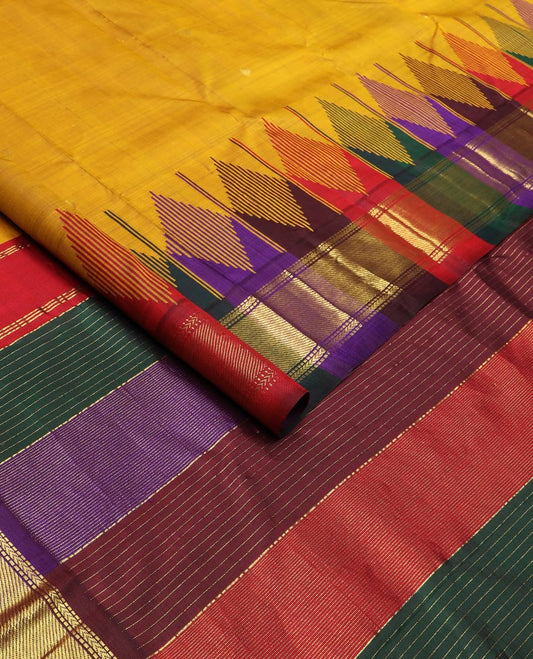 Mustard zari buttas silk saree, contrast one-sided temple border of muthu, kathir & zari stripes & kaleidoscopic-colored striped pallu of zari stripes
