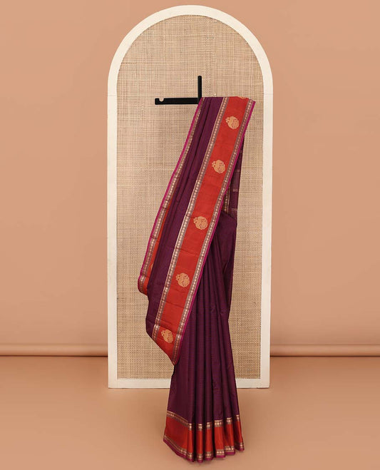 Purple striped Kanchipuram silk saree, contrast border of rekku, muthu, rudraksham and iruthalai pakshi motifs, and zari striped pallu