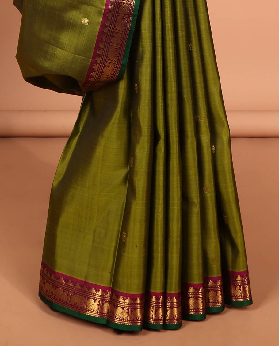 Green buttas kancheepuram silk saree with contrast border of rekku, muthu, yaanai design & checked zari design pallu