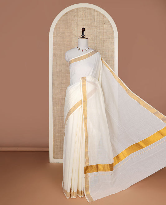 Cream plain design Kerala saree, zari border, and zari pallu
