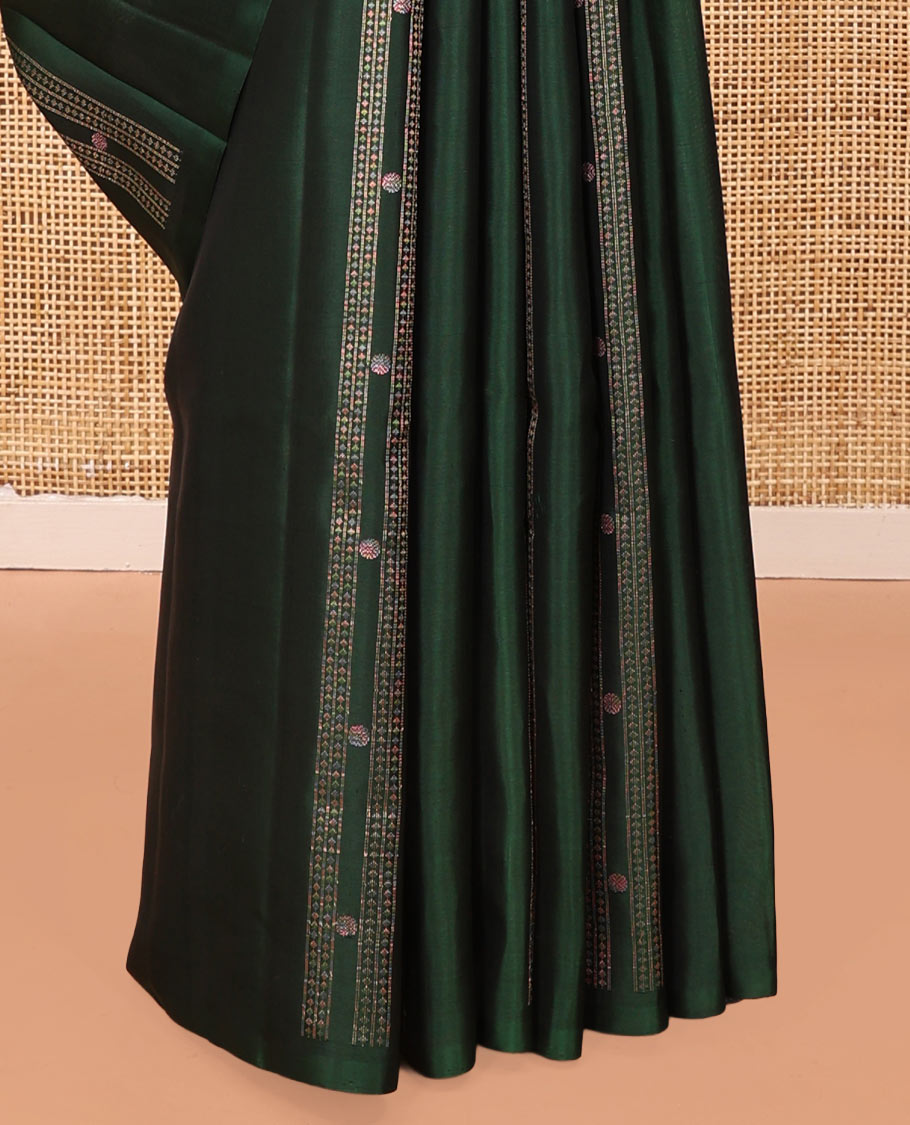 Borderless Green Mayuri Soft Silk Saree, Embellished with Stripes, Diamonds, and Poun Buttas All Over Its Body, Highlighted by a Geometric Design Pallu, and Paired with a Matching Blouse