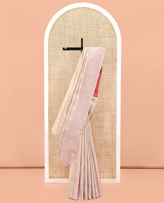 Borderless Cream-based Mayuri Soft Silk Saree, Steeped with Multi-color Stripes All Over Its Body, Complemented by Contrast Seppu Rekku Pallu, and Paired with a Contrast Blouse