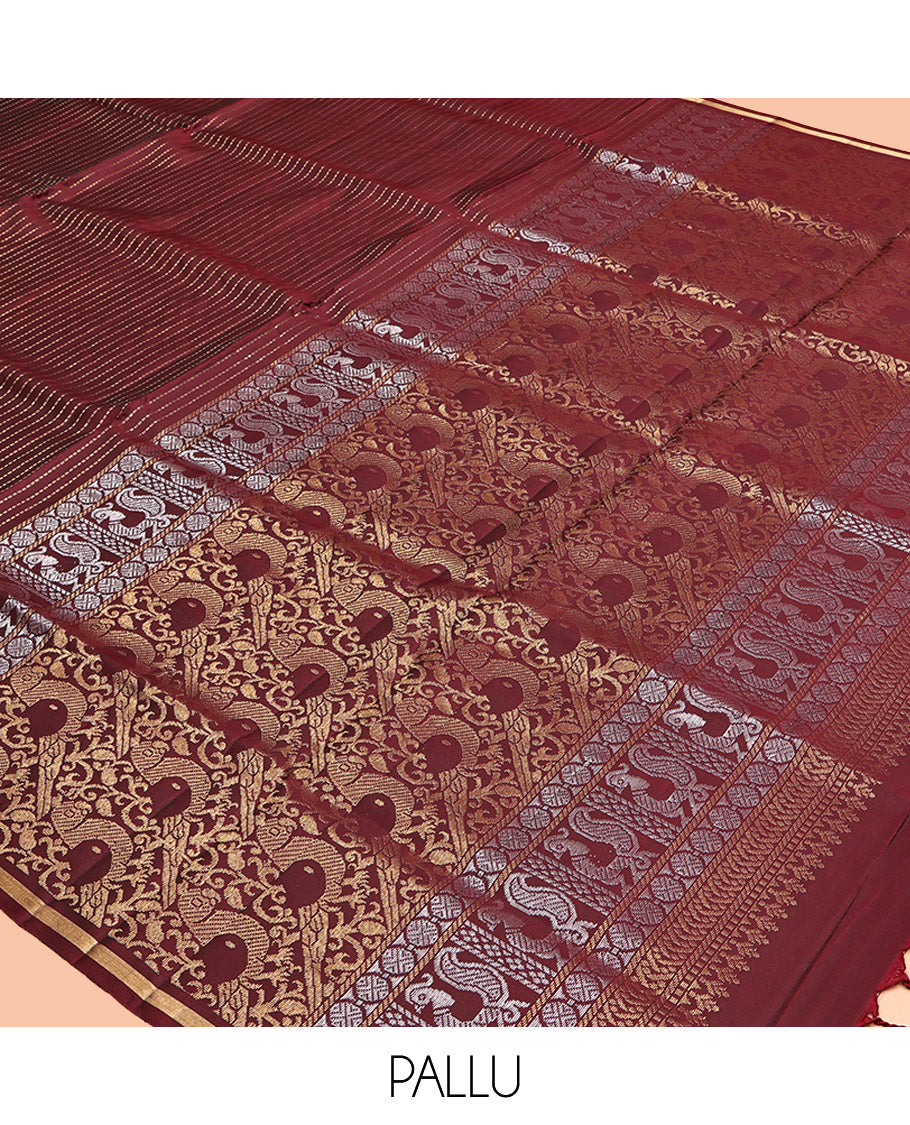 Maroon Mayuri Lite Silk Mix Saree, Highlighted by Muthu Zari Stripes, a Subtle Piping Border, Pallu Steeped with Parrot Designs, and a Matching Blouse
