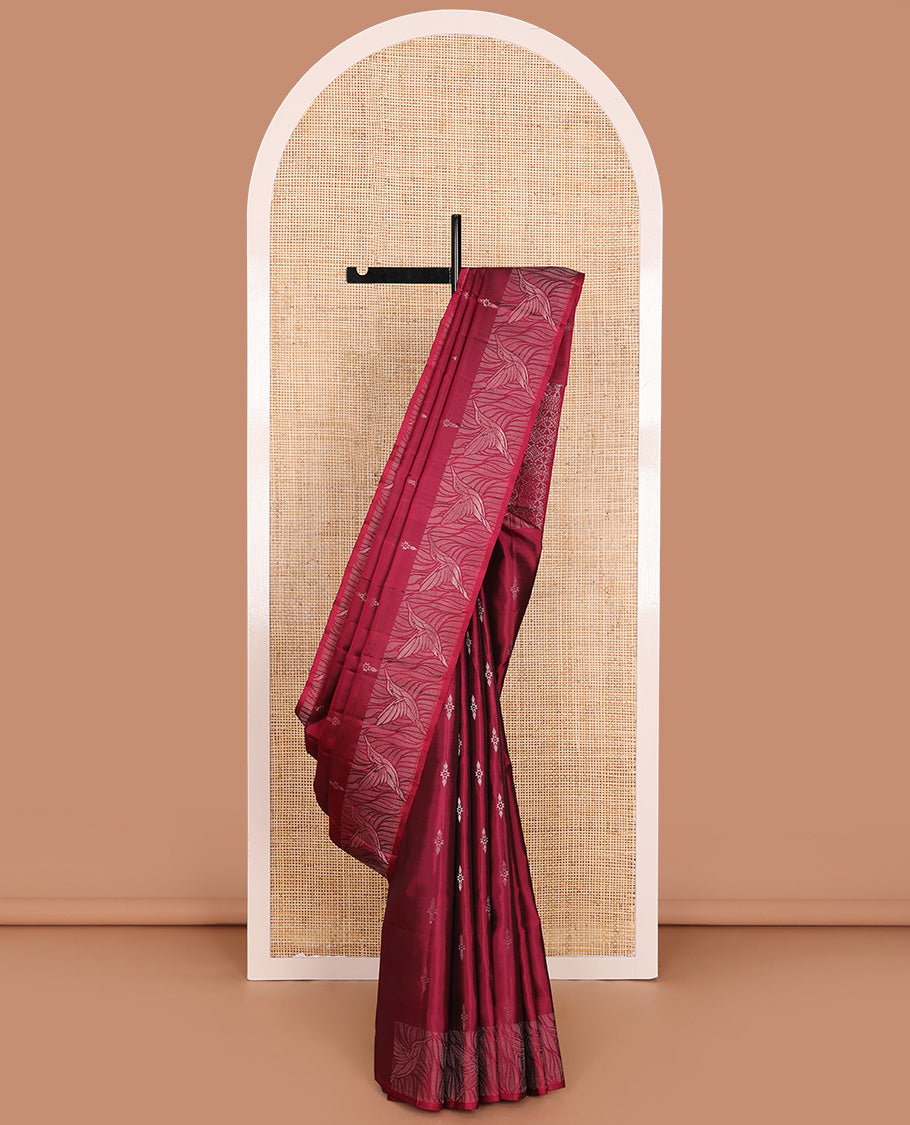 Red Mayuri Soft Silk Saree Subtly Sparkled with Buttas All Over Its Body, Highlighted by Zari Border of Kingfisher Bird Motifs, Pallu Features Geometric Patterns, and Paired with a Matching Blouse