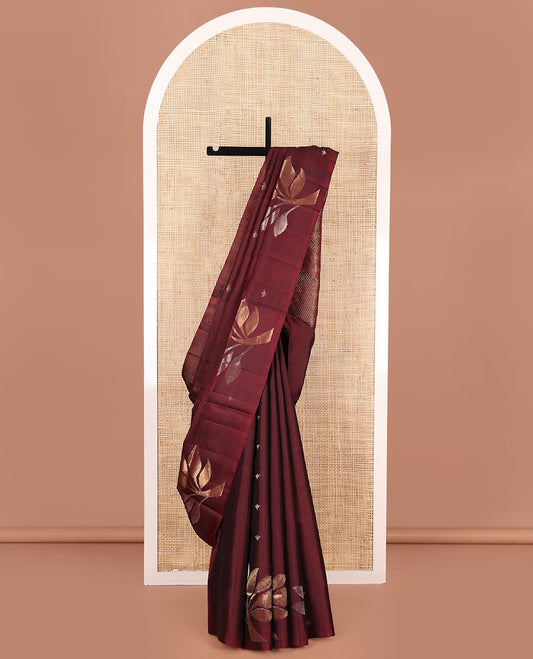 Borderless Maroon Mayuri Soft Silk Saree, Adorned with Buttas and Tree Buttas All Over Its Body, Subtle Pallu of Diagonal Vine Designs, and Paired with a Matching Blouse