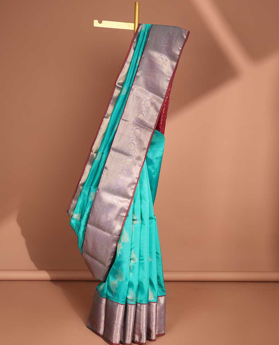 Blue floral buttas vasudhara elite silk saree with contrast intricate zari design border & floral, checked design pallu