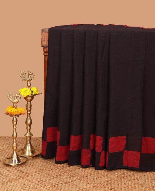 Black kota cotton saree with box type pathik printed border & printed pallu along with printed blouse