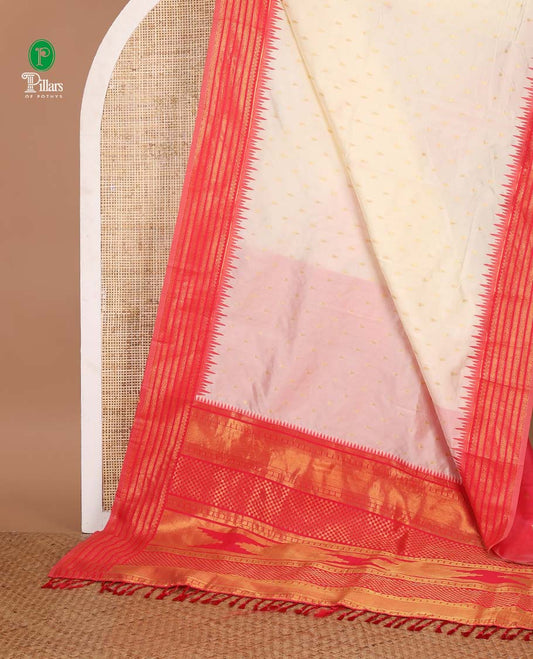 Cream with rani pink temple butta kanchi silk saree with temple, traditional zari border & rich weaving pallu along with butta design blouse