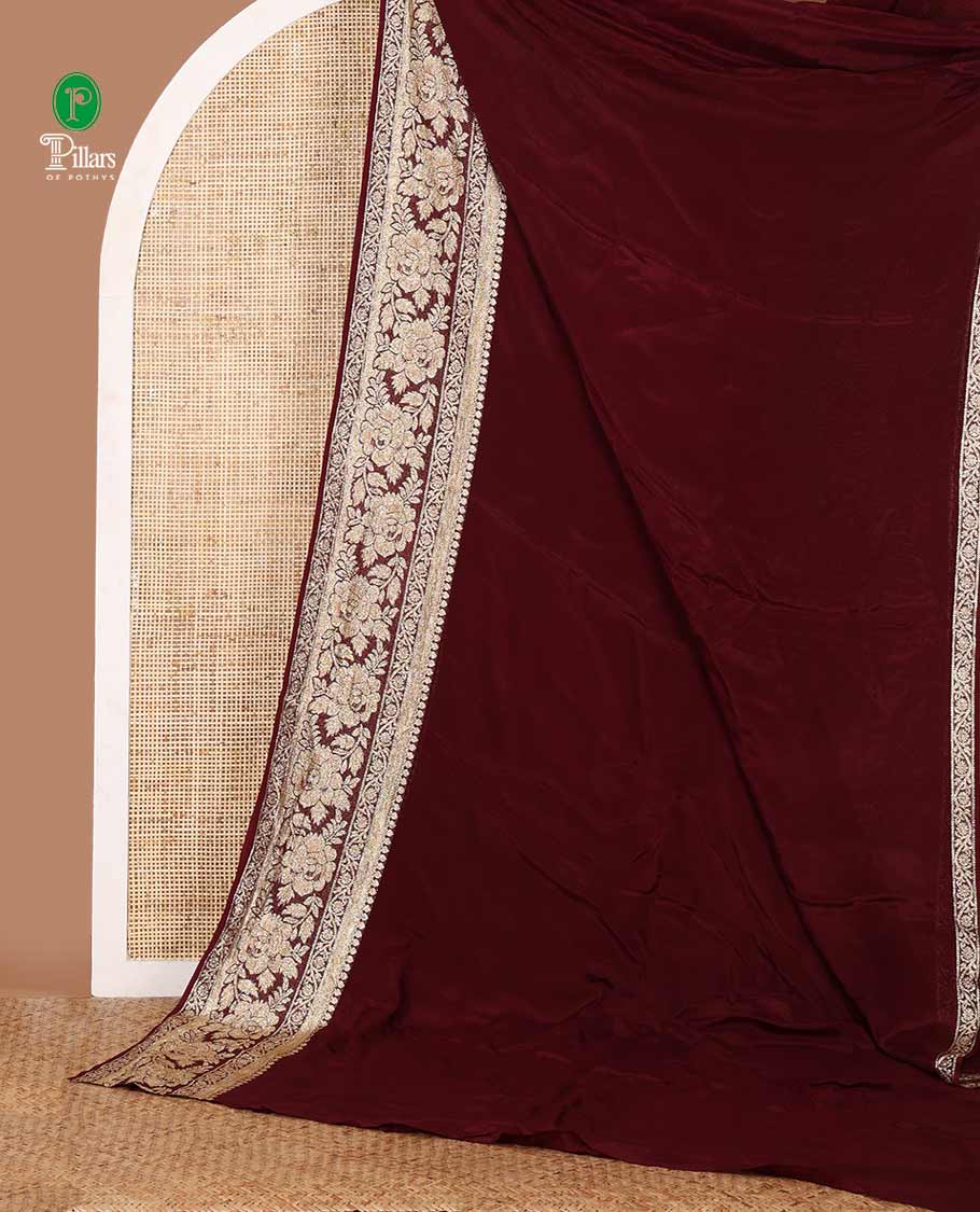 Purple plain crepe saree, zari border steeped with rose floral designs, plain pallu & blouse of zari polka dots